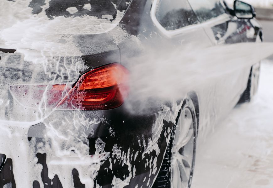 pressure washing a car