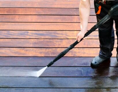 pressure washing a wooden deck